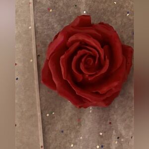 Hand poured ceramic rose 3in diameter break able by 3 1/2 inches.